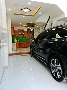 Nhà phố Quận Bình Thạnh Nhà hẻm xe hơi đường Nơ Trang Long thiết kế 1 trệt, 1 lửng và 3 lầu.