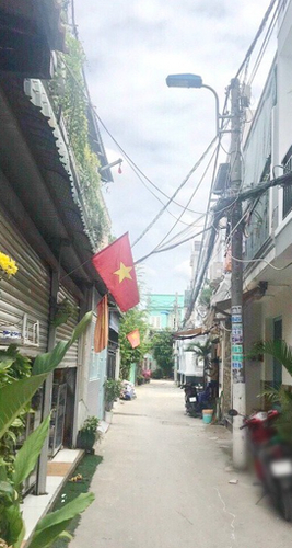 Nhà phố Quận 7 Nhà 1 trệt, 2 lầu diện tích 60m2, cách trường TH Nguyễn Văn Hưởng 200m.