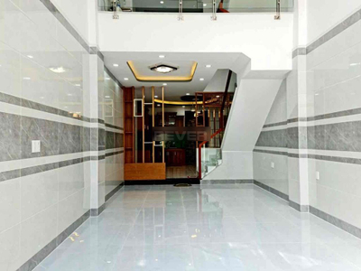 Nhà phố Quận Bình Thạnh Nhà hẻm xe hơi đường Nơ Trang Long thiết kế 1 trệt, 1 lửng và 3 lầu.