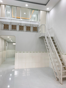 Nhà phố Quận 9 Nhà phố thiết kế 1 trệt, 1 lửng diện tích 58.2m2, cửa hướng Đông Nam.