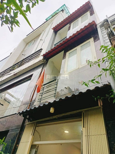 Nhà phố đường Trần Văn Đang diện tích 16.2m2, cửa hướng Tây.