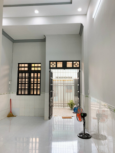 Nhà phố Quận 9 Nhà phố thiết kế 1 trệt, 1 lửng diện tích 58.2m2, cửa hướng Đông Nam.