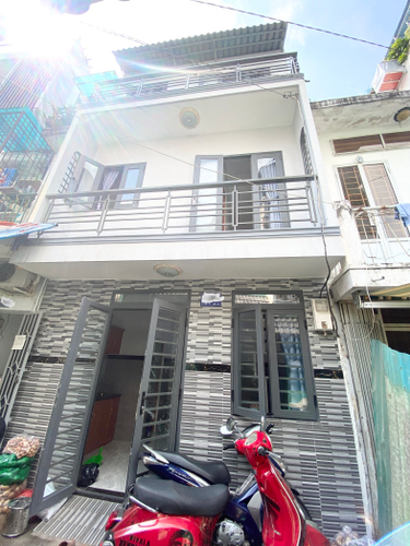 Nhà phố Quận Gò Vấp Nhà phố thiết kế 1 trệt, 2 lầu kiên cố, ngay trường ĐH Công Nghiệp.