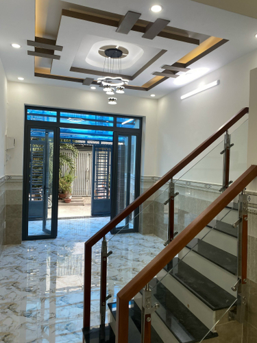 Nhà phố Quận 6 Nhà phố thiết kế 1 trệt, 2 lầu và sân thượng, cửa hướng Nam mát mẻ.