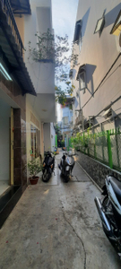 Nhà phố Quận 7 Nhà phố có diện tích 4mx 12m vuông vắn, khu vực dân cư đông đúc.