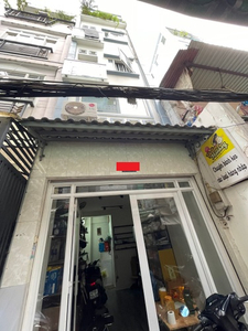 Nhà phố đường Đoàn Văn Bơ diện tích 21.6m2, cửa hướng Đông Nam.