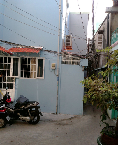 Nhà phố Quận 6 Nhà thiết kế 1 trệt, 1 lầu cửa hướng Tây Nam, cách chợ Tân Hòa Đông 50m.