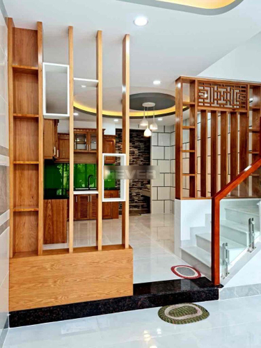 Nhà phố Quận Bình Thạnh Nhà hẻm xe hơi đường Nơ Trang Long thiết kế 1 trệt, 1 lửng và 3 lầu.