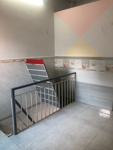 Nhà phố Quận Tân Phú Nhà phố đường Âu Cơ sầm uất, thiết kế 1 trệt, 1 lửng và 1 lầu chắc chắn.