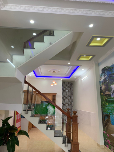 Nhà phố Quận Bình Tân Nhà phố thiết kế 1 trệt và 2 lầu kiên cố, cửa hướng Tây đón nắng sớm.