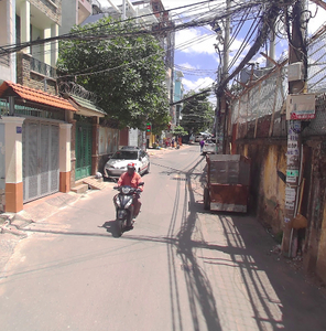 Đường trước nhà phố Quận Bình Thạnh Nhà phố hẻm xe hơi đường Phan Văn Trị, kết cấu 1 trệt, 4 lầu đúc chắc chắn.